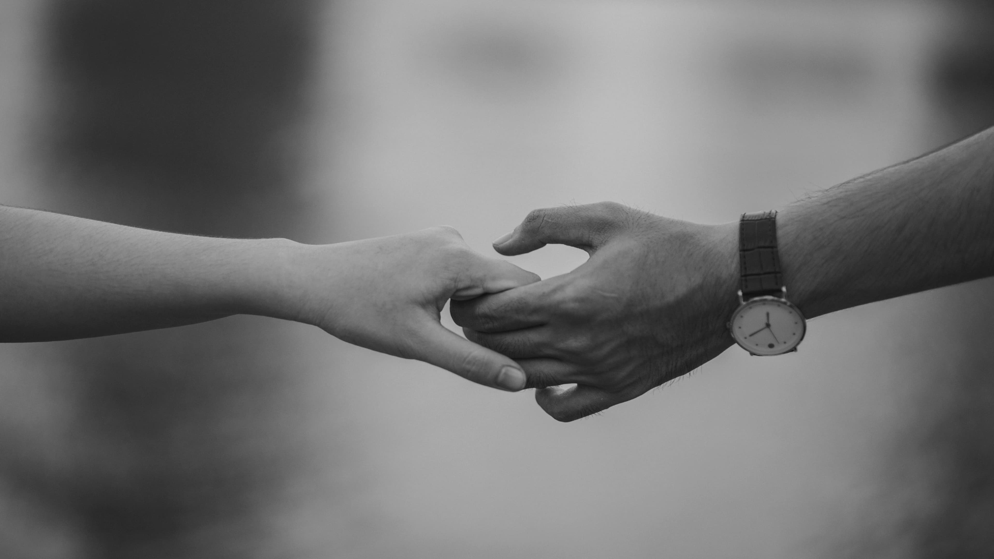 Two people in conversation, representing compatibility beyond a numerical score